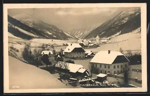 AK Pusterwald /Stmk., Ortsansicht mit Kirche im tiefen Schnee