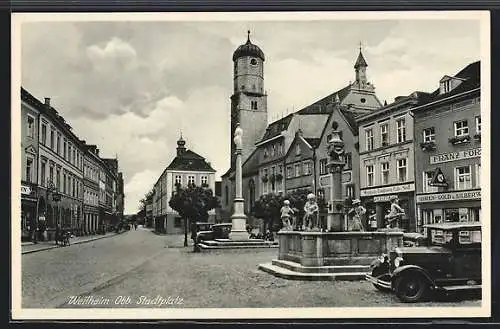 AK Weilheim /Obb., Stadtplatz mit Geschäften, Kirche und Brunnen