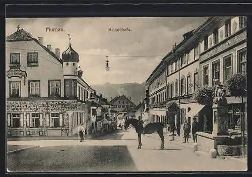 AK Murnau / Staffelsee, Reiter vor einem Denkmal in der Hauptstrasse, Gasthaus, Bes. Georg Kirchmeir