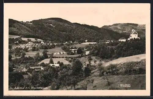 AK St. Johann bei Herberstein, Ortsansicht mit bewaldeten Bergen