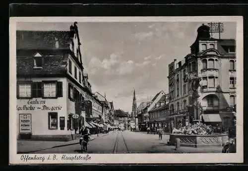 AK Offenburg i. B., Hauptstrasse mit Einhorn-Apotheke-Drogerie