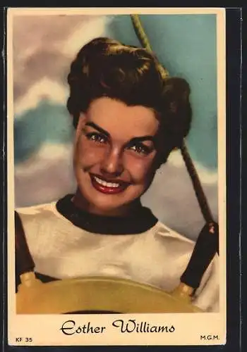 AK Schauspielerin Esther Williams, am Steuerrad eines Schiffes gesehen