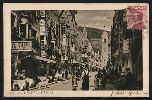 AK Sterzing am Brenner, Strassenpartie mit Hotel Alte Post E. P. Kleewein und Turm