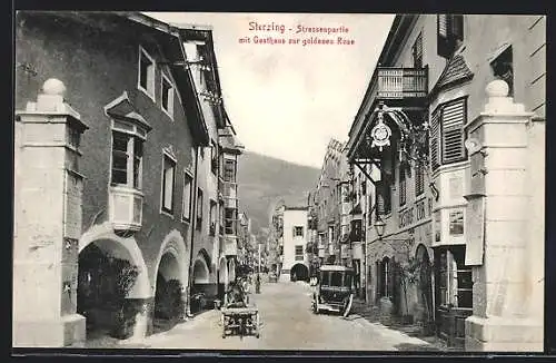 AK Sterzing, Strassenpartie mit Gasthaus zur goldenen Rose