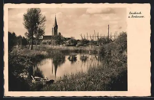 AK Eriskirch /Bodensee, kleine Kirche, mit Ruderboot und Teich