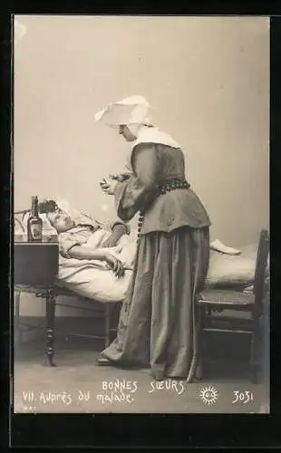 AK Krankenschwester vom Roten Kreuz gibt einem Kranken Medizin