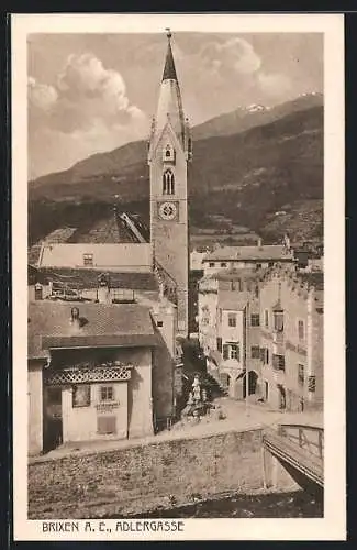 AK Brixen a. E., Adlergasse mit Kirche