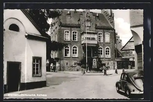 AK Rheinböllen /Hunsrück, Strassenpartie mit Rathaus