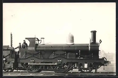 AK 6-wheeled locomotive no. 3229 with crew