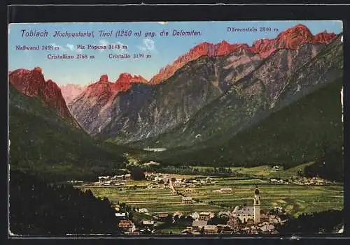 AK Toblach, Ortsansicht gegen die Dolomiten