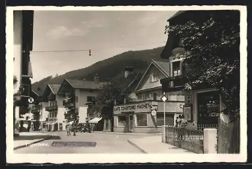 AK Tegernsee, Strasse mit Cafe-Konditorei Machet