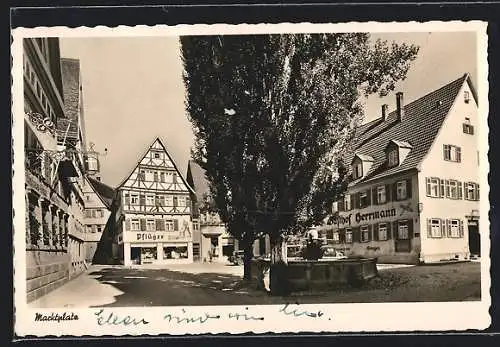 AK Münsingen, Marktplatz mit Gasthof Herrmann