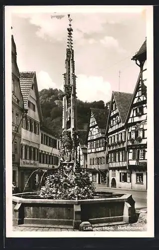 AK Urach, Marktbrunnen, Geschäfte am Markt