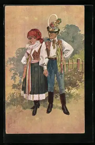 Künstler-AK Junges slowakisches Paar in Trachten im Garten