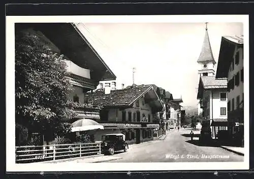 AK Wörgl in Tirol, Hauptstrasse mit Kirche