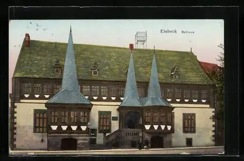 Goldfenster-AK Einbeck, Rathaus mit leuchtenden Fenstern