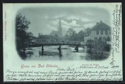 Mondschein-AK Bad Oldesloe, Gasthaus Zum Krahn mit Brücke, Im Hintergrund Kirche