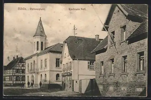 AK Biblis, Rathausplatz mit Geschäft von Kaufmann Neff