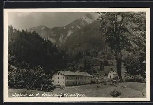 AK St. Lorenzen im Lesachtal, Heilbad Tuffbad mit Kirche und Bäumen