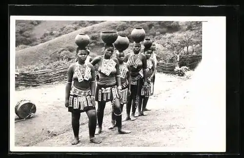 AK Five Women with bead decorations carry pottery vessels on their heads