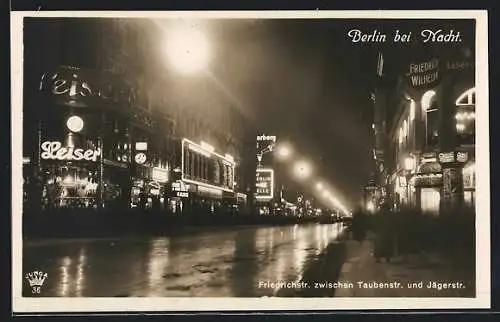 AK Berlin, Friedrichstrasse, zwischen Taubenstrasse und Jägerstrasse, Ansicht bei Nacht