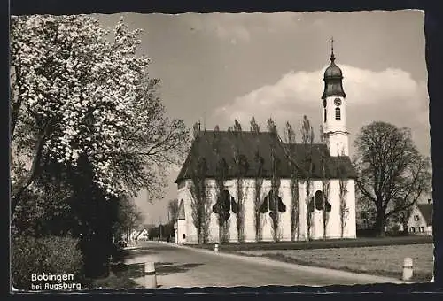 AK Bobingen bei Augsburg, Baumblüte vor der Kirche