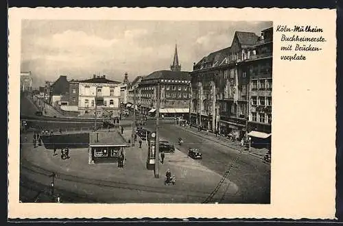 AK Köln-Mülheim, Brückenvorplatz und Buchheimerstrasse mit Geschäften