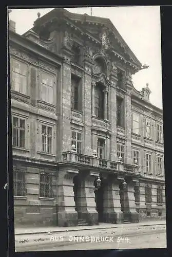 AK Innsbruck, Strassenpartie mit Gebäudefassade
