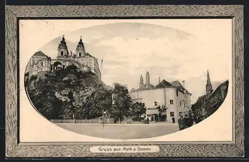 Präge-AK Melk a. Donau, Strassenpartie mit Geschäft und Kirche, Passepartout