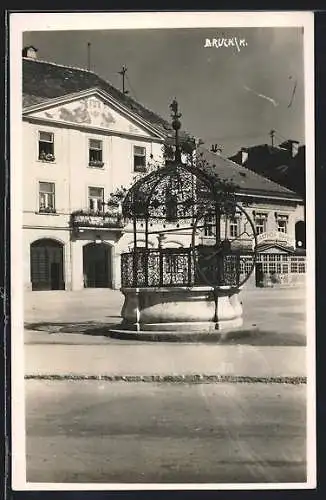 AK Bruck /Mur, Brunnen und der Gasthof Mayer