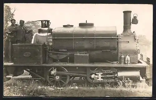 AK Worker on Locomotive, englische Eisenbahn