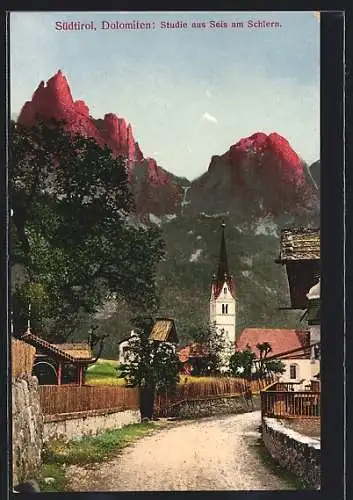 AK Seis am Schlern / Siusi allo Sciliar, Strassenpartie an der Kirche