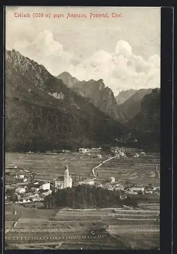 AK Toblach /Pustertal, Teilansicht mit Kirche gegen Ampezzo