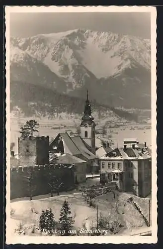 AK Puchberg a. Schneeberg, Winterliche Teilansicht mit Kirche