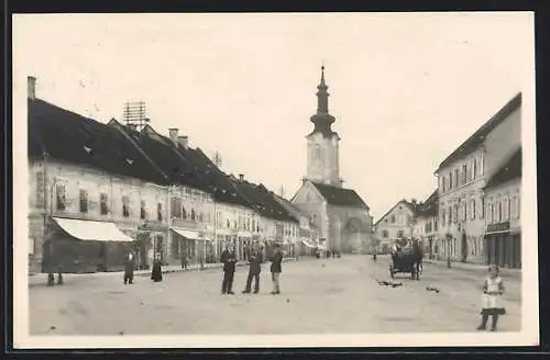 AK Leibnitz, Oberer Platz mit Geschäften und Kirche