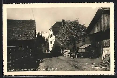 AK Iselsberg-Stronach, Wacht am Iselsberg, Ortspartie mit Durchblick auf die Berge