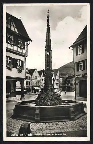 AK Urach / Württbg., Marktplatz mit Hamburger Kaffee-Lager und Marktbrunnen