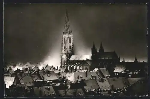 AK Freiburg i. Br., Winterliche Kirche bei Nacht