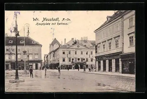 AK Wr. Neustadt /N.-Oe., Hauptplatz mit Geschäft und Rathaus