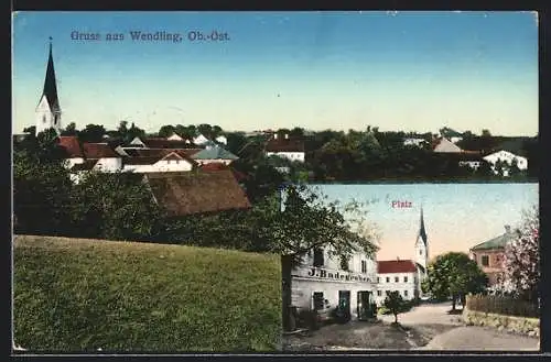 AK Wendling /Ob.-Öst., Platz mit Geschäftshaus Badegruber und Kirche, Ortsansicht aus der Vogelschau