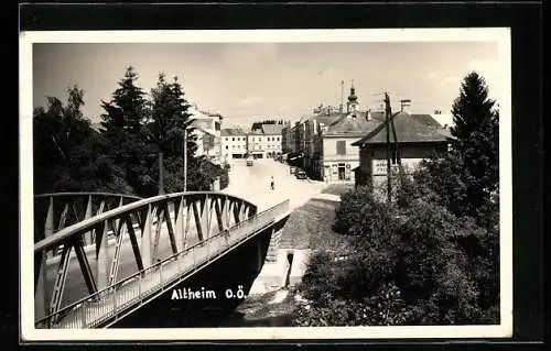 AK Altheim, Strassenpartie mit Friseursalon von einer Brücke aus