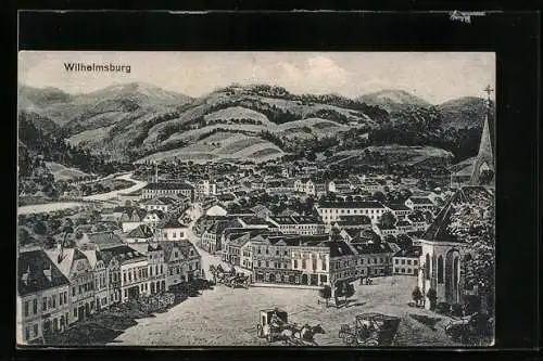 Künstler-AK Wilhelmsburg, Teilansicht mit Kirche und Strassenpartie