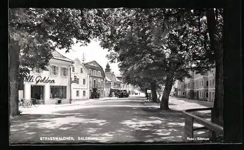 AK Strasswalchen, Strassenpartie mit Drogerie Goldner