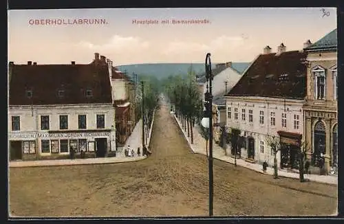 AK Oberhollabrunn, Hauptplatz und Bismarckstrasse mit Buchhandlung Maximilian Jordan