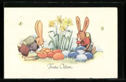 Künstler-AK Junge Osterhasen verteilen ihre bunten Eier
