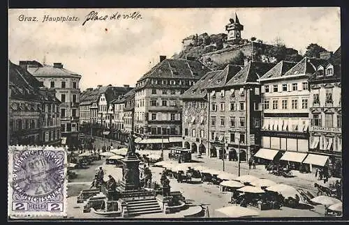 AK Graz, Hauptplatz mit Denkmal, Strassenbahn und Häuserfassaden, Cafe, Warenhaus