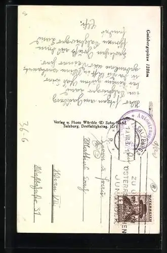 AK Gaisbergspitze, Gipfelkreuz gegen Wohnhäuser