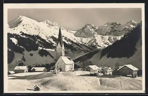 AK Mittelberg /Vorarlberg, Ortsansicht im Winter