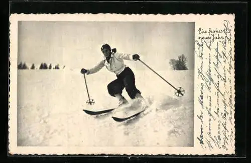 AK Skiläuferin an einem Abhang, Neujahrsgruss