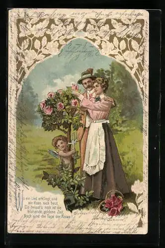 AK Amor bei einem Liebespaar an einem Rosenstrauch